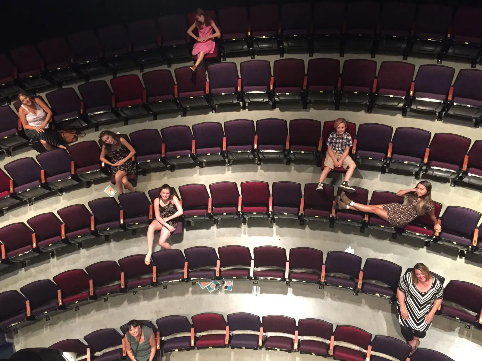 Overhead view of theatre students sitting in auditorium seats in a theater in the Oregon CIty campus