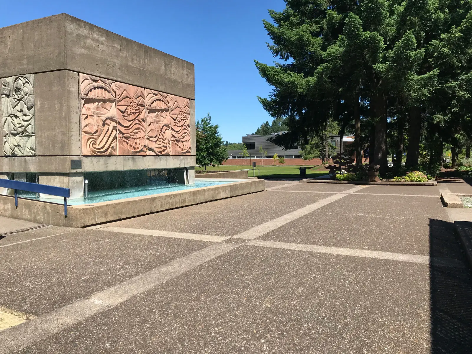 The stone structure and fountain in the quad next to Barlow Hall on the Oregon City campus