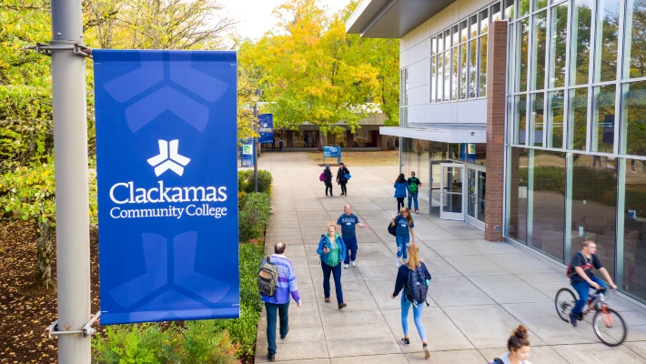 An aerial view of CCC's Oregon City campus with students walking and biking between buildings